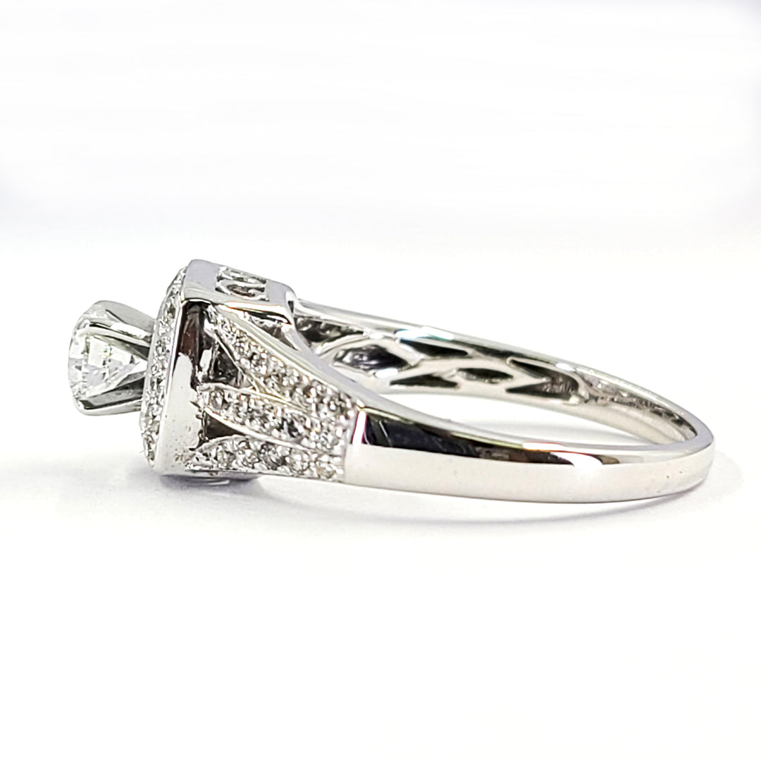 Raised Center Diamond Halo Engagement Ring