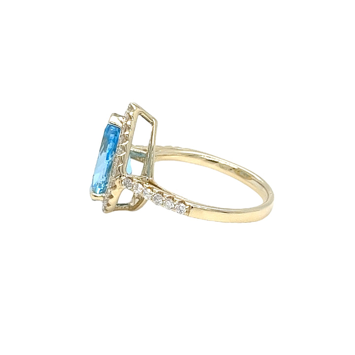 Blue Topaz and Diamond Halo Ring