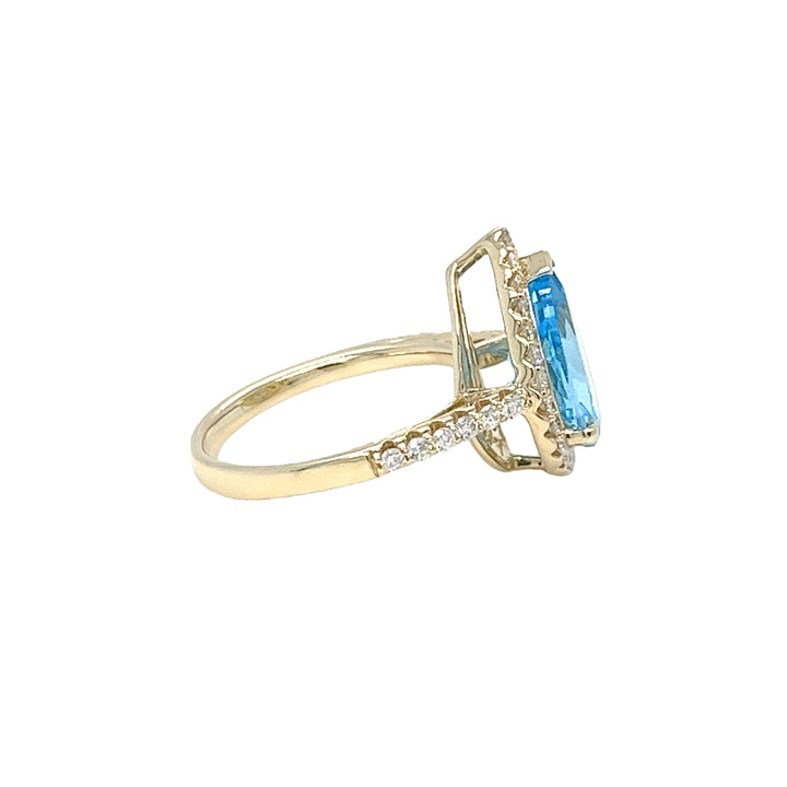Blue Topaz and Diamond Halo Ring