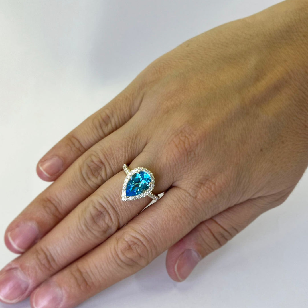 Blue Topaz and Diamond Halo Ring