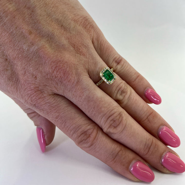 Emerald Cut Emerald and Diamond Halo Ring