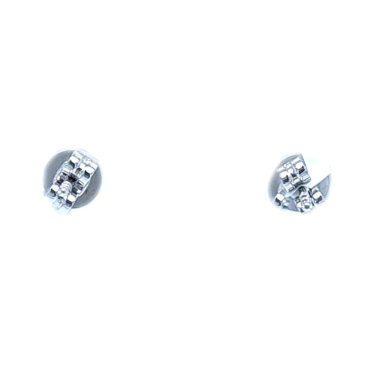 Blue Topaz and Diamond Halo Stud Earrings