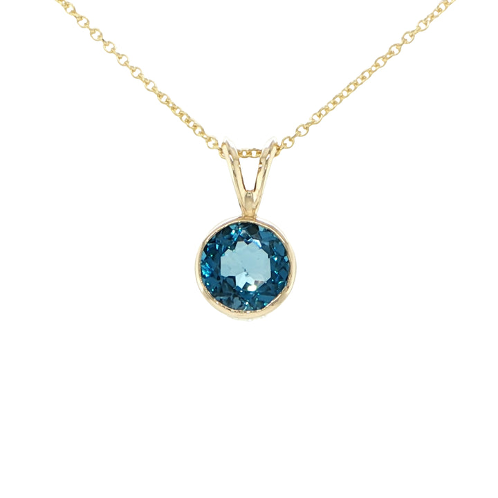 14K Yellow Gold Blue Topaz Pendant