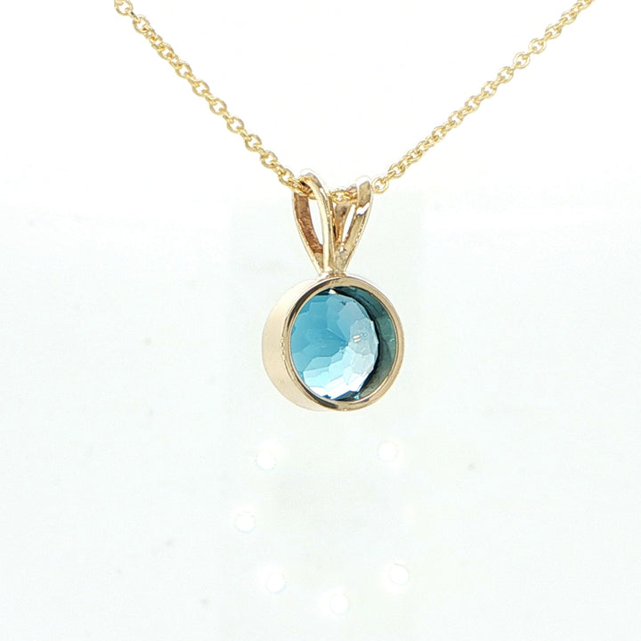 14K Yellow Gold Blue Topaz Pendant