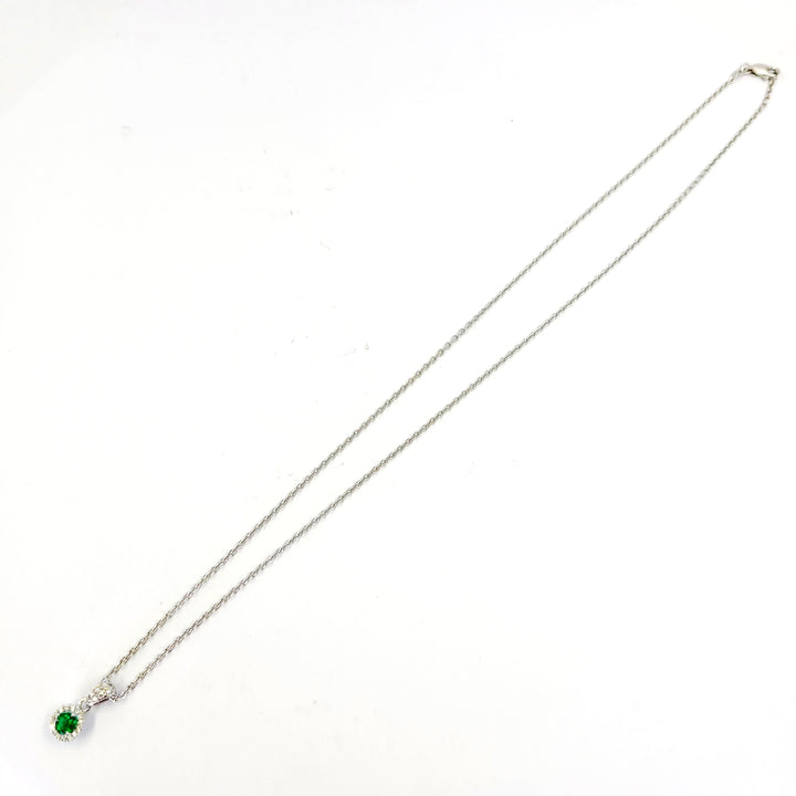 Emerald and Diamond Halo Pendant Necklace