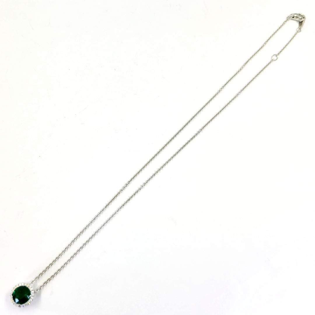 Emerald and Diamond Halo Pendant Necklace