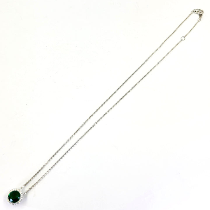 Emerald and Diamond Halo Pendant Necklace