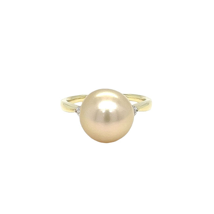 Anillo con halo de diamantes y perlas