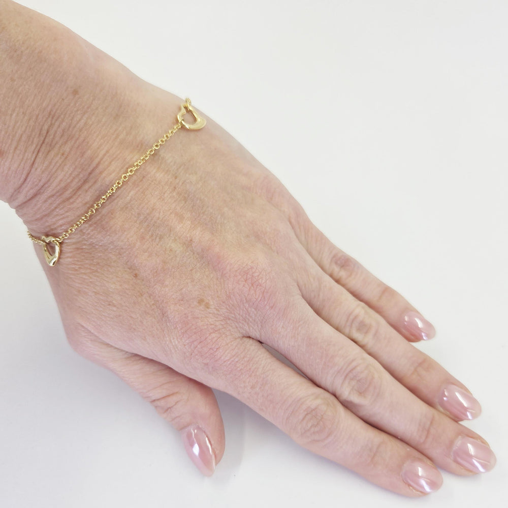 Tiffany & Co. Elsa Peretti 18K Yellow Gold Three Heart Station Bracelet