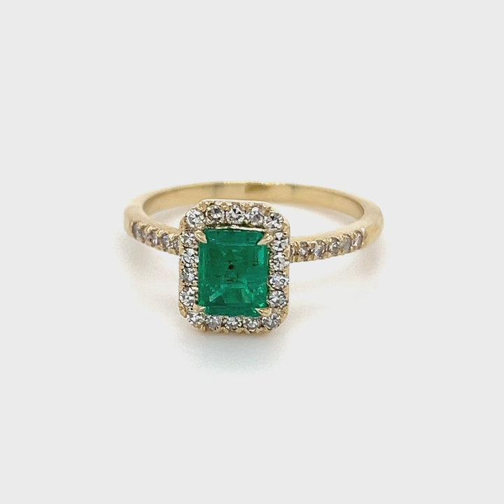 Emerald Cut Emerald and Diamond Halo Ring