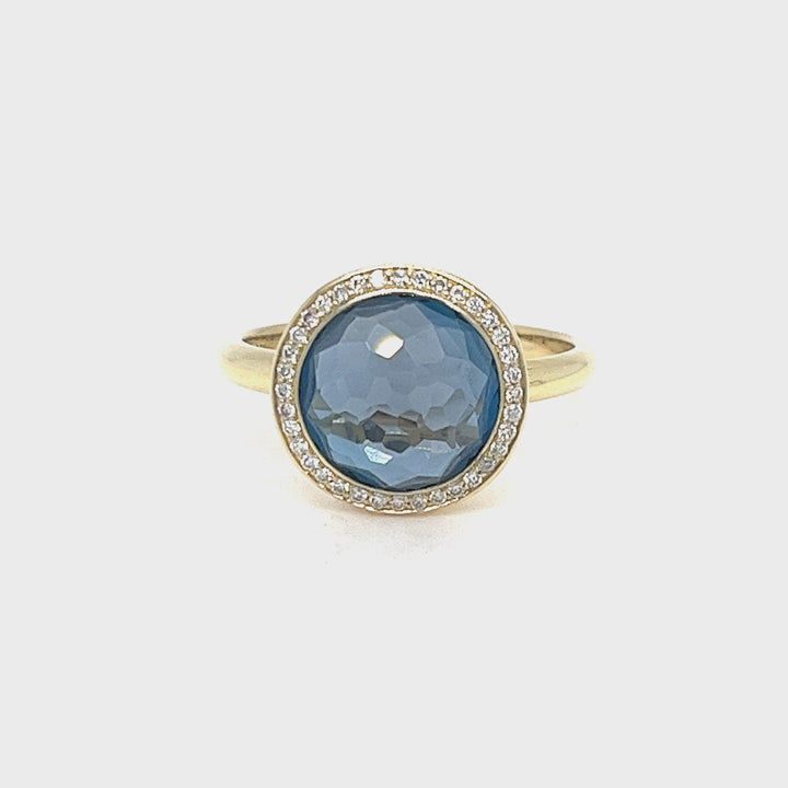 Anillo de cóctel con topacio blanco y diamantes