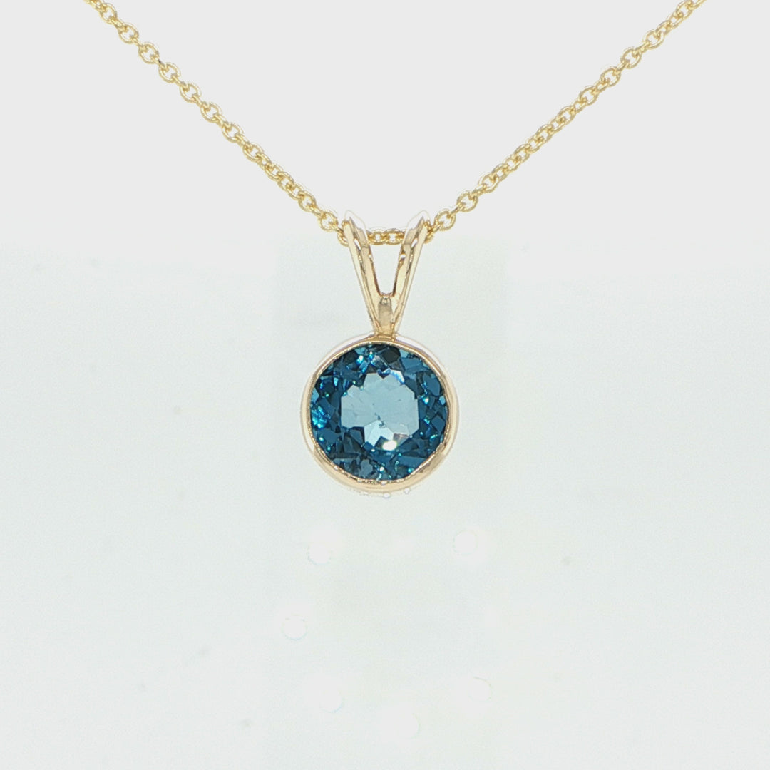 14K Yellow Gold Blue Topaz Pendant