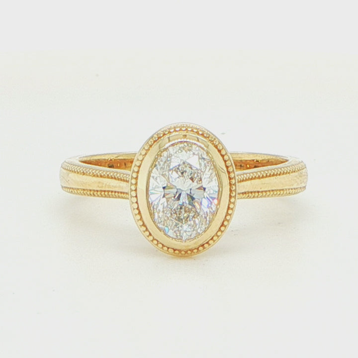 14K Yellow Gold Oval Diamond Bezel Ring