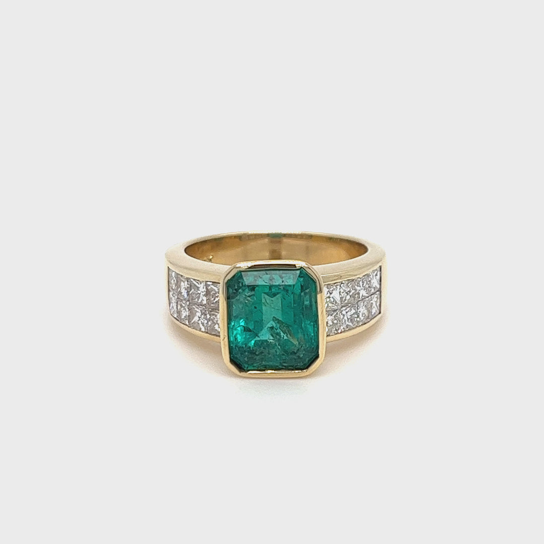 Emerald and Princess Cut Diamond Ring