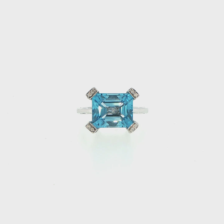 Blue Topaz and Diamond Ring