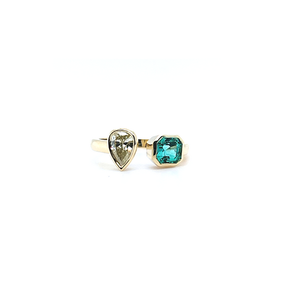 Bezel-set-diamond-and-emerald-open-ring